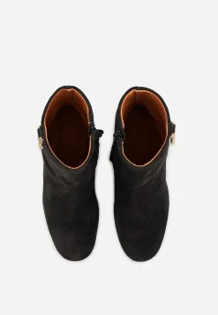 Bons baisers Bottes Et Bottines|Louise
